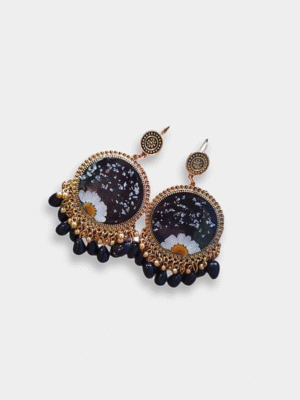 Handmade resin earrings with real pressed white daisies, black galaxy background and dangling black beads